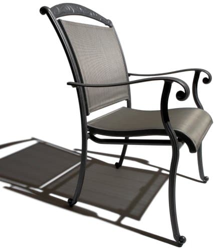 Side view of a Strathwood Ryer dining chair, showing its curved arm and sling-seat profile.