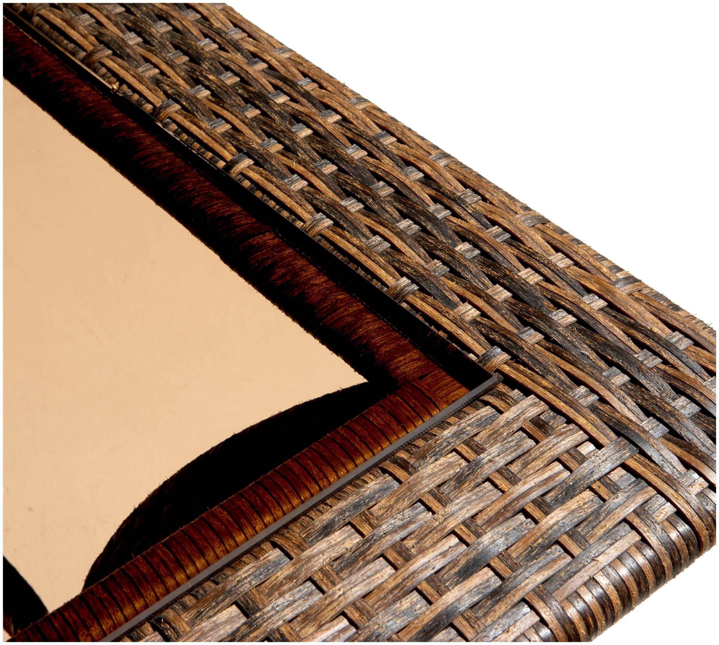 Close view of the Strathwood wicker coffee table's woven corner and inset glass edge.