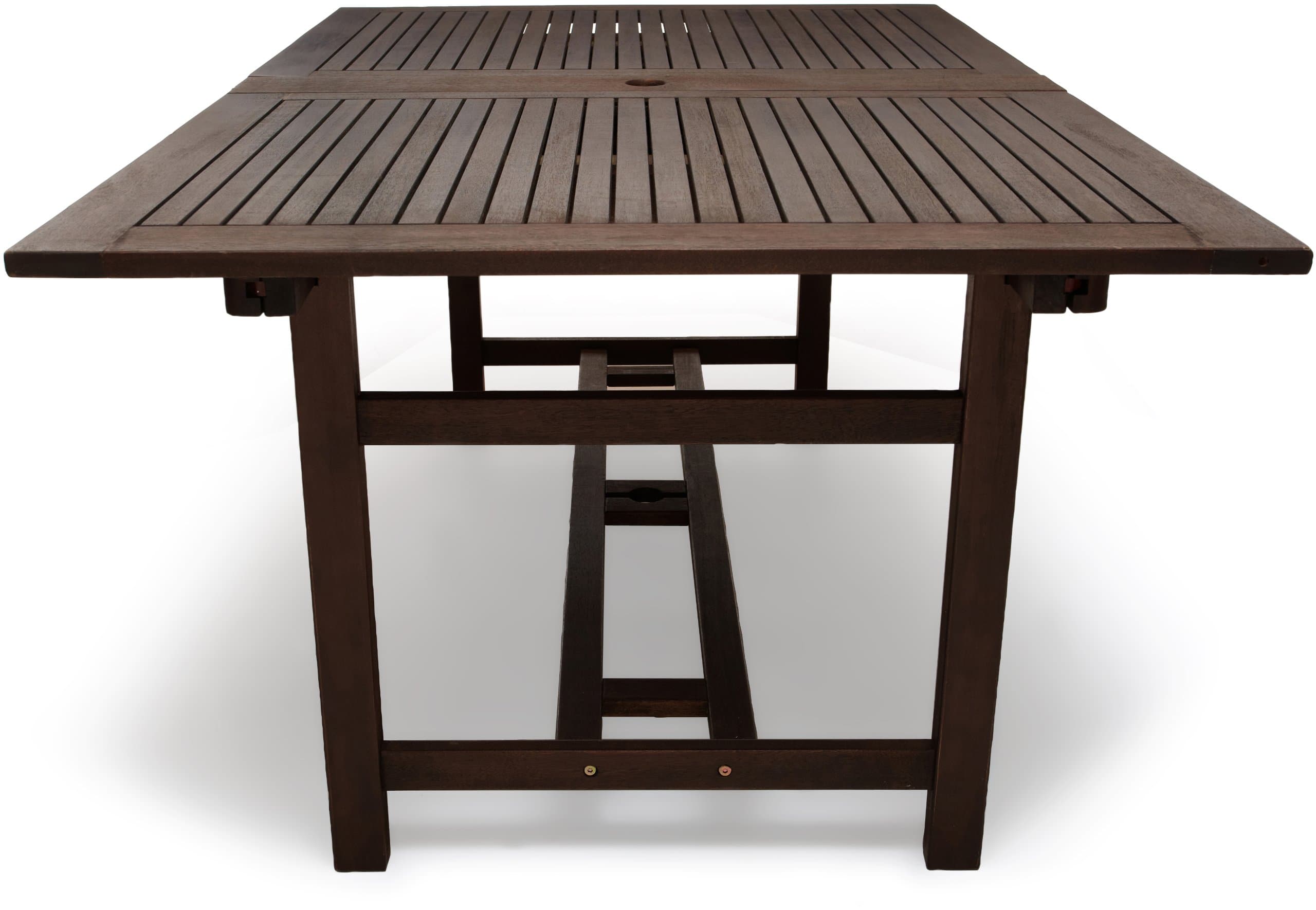 End view of the Strathwood Blakely dining table, showing its slatted tabletop and supporting frame.