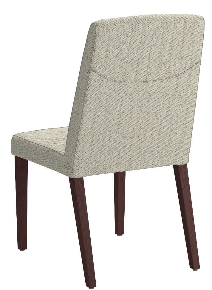 One ivory Rivet channel-back dining chair from the set of two, rear three-quarter view.