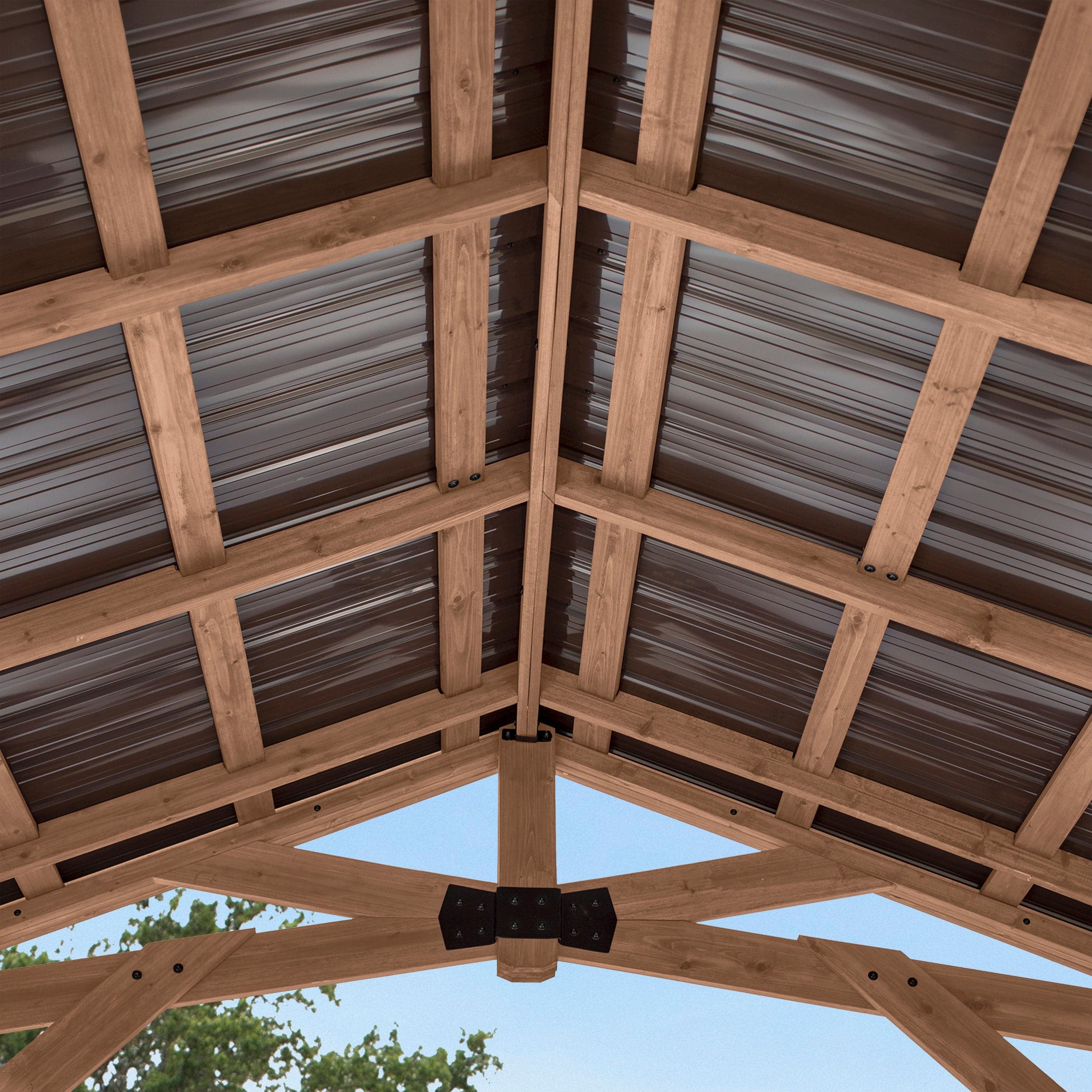 View upward into the galvanized steel roof and cedar rafters