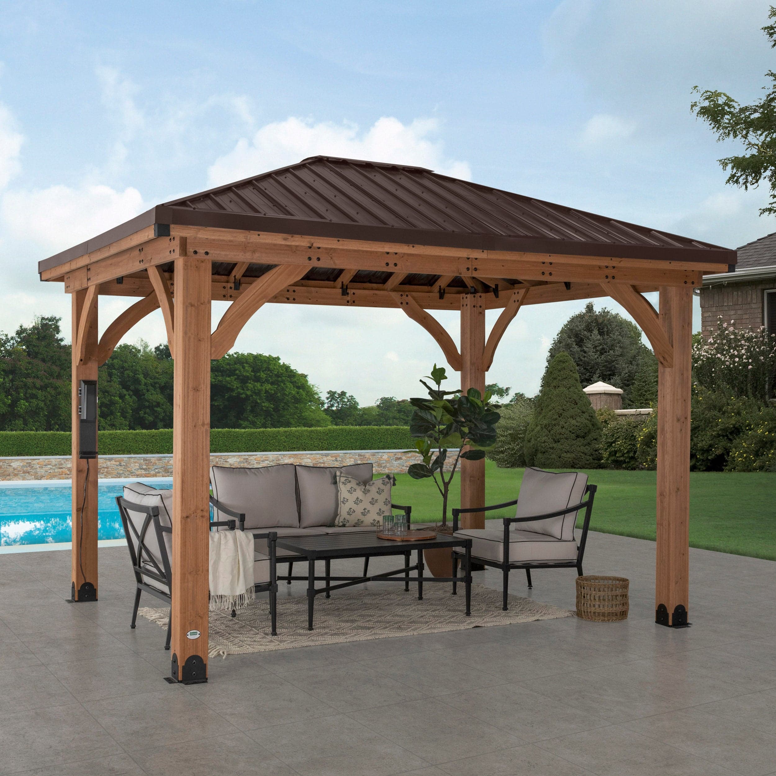 Three-quarter view of the Barrington gazebo beside a swimming pool