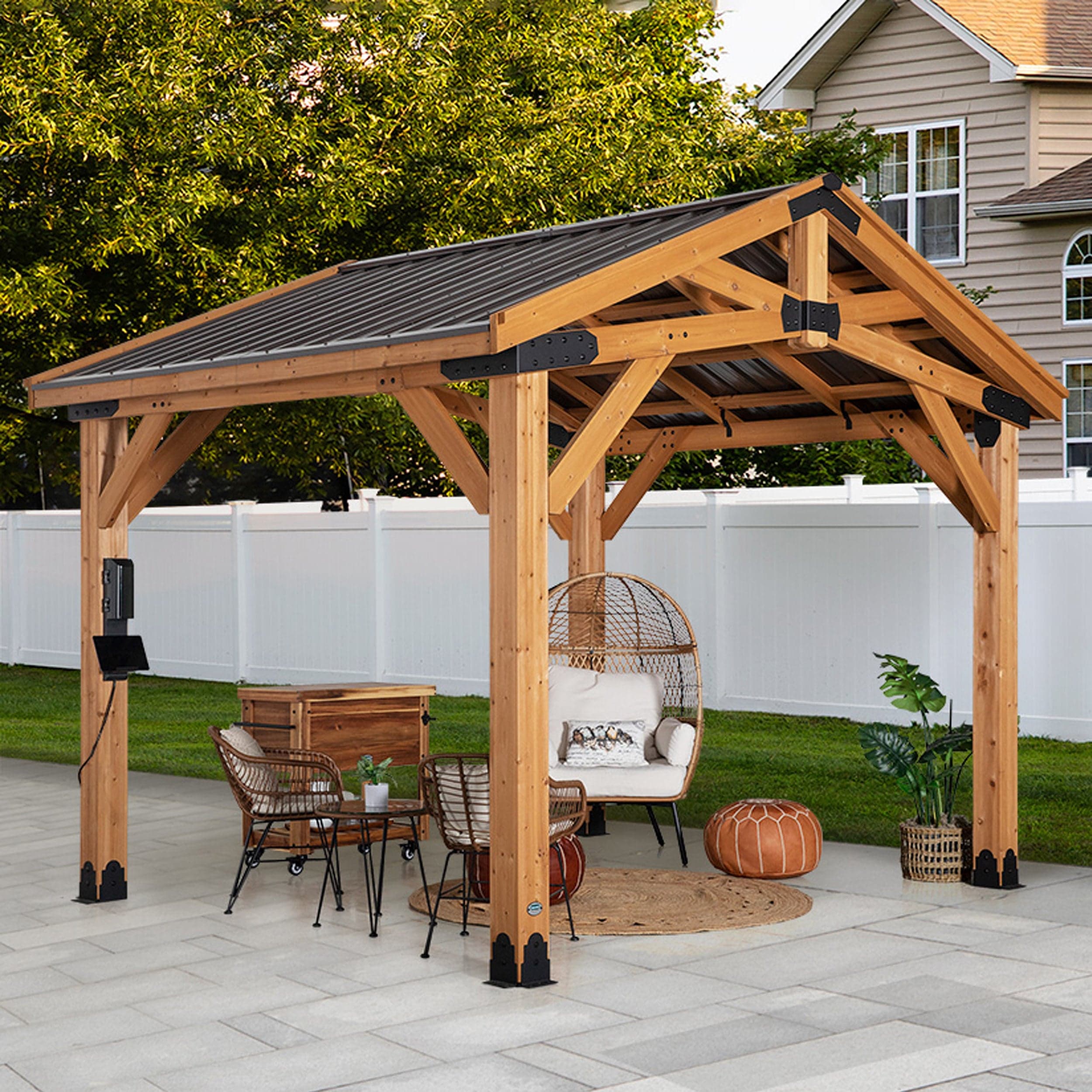 Three-quarter view of the cedar Norwood gazebo covering outdoor seating