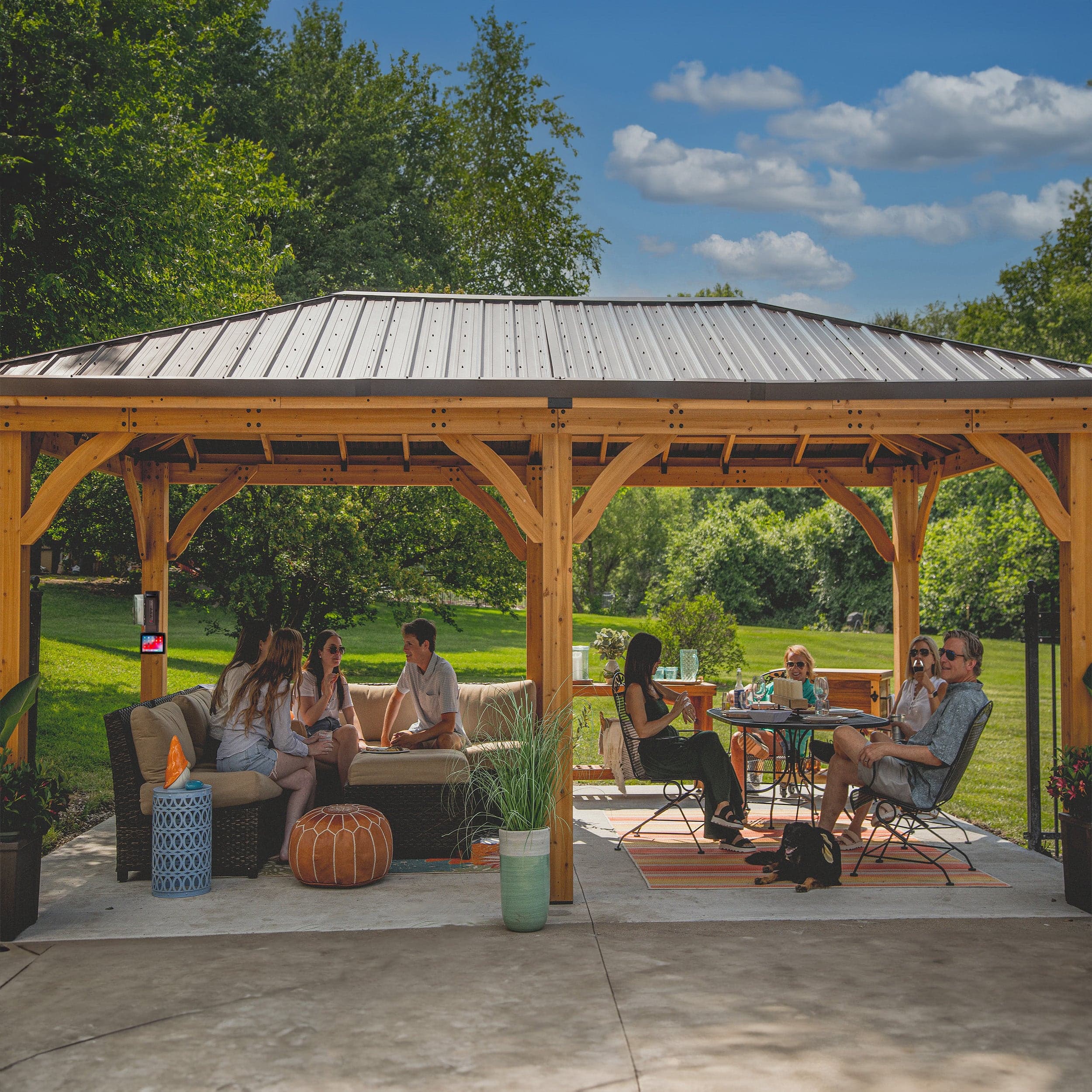 Front lifestyle view of the Barrington gazebo sheltering a group seating area
