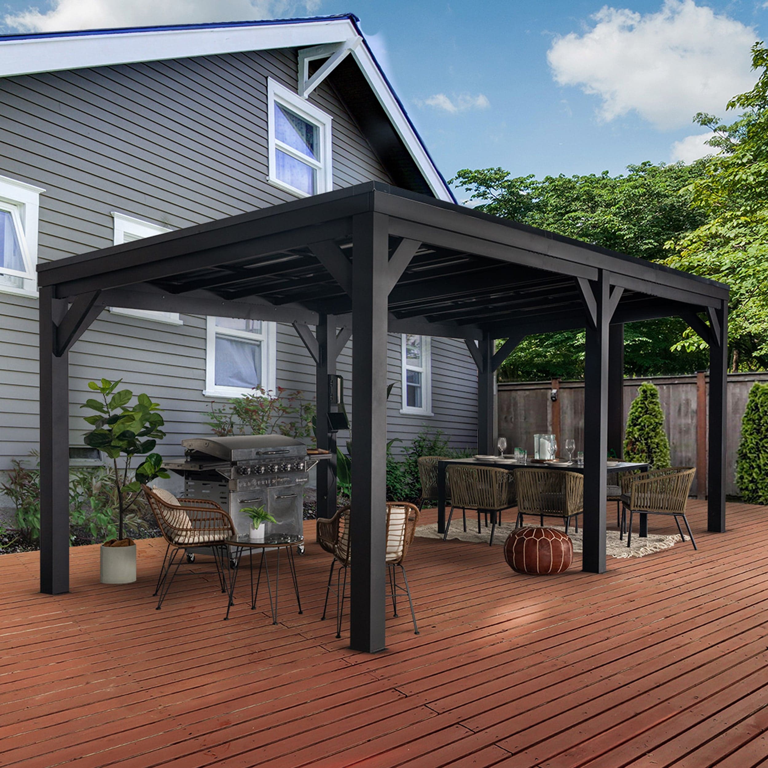 Three-quarter view of the wide black steel Stonebridge gazebo on a deck