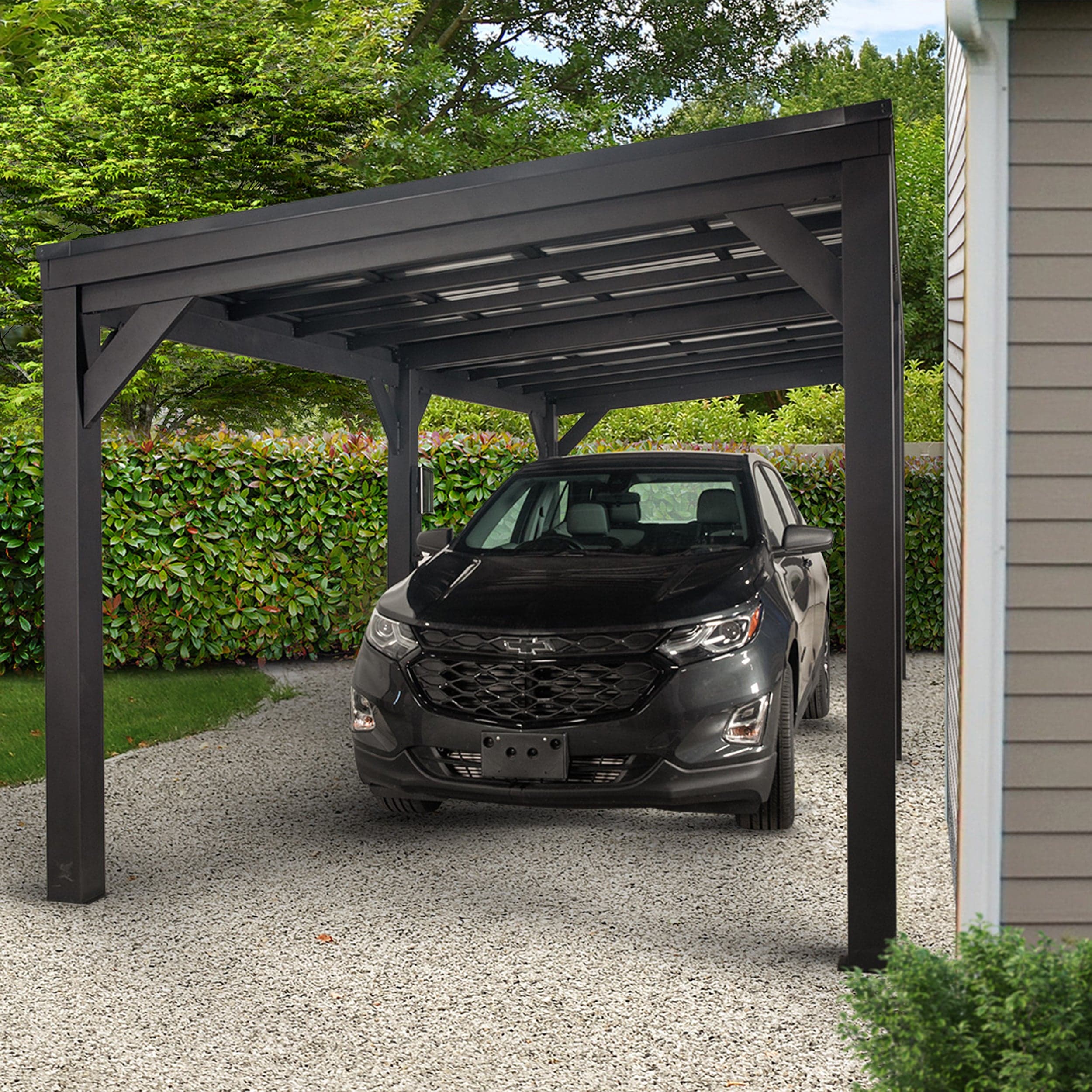 Front view of the Stonebridge shelter used as a carport