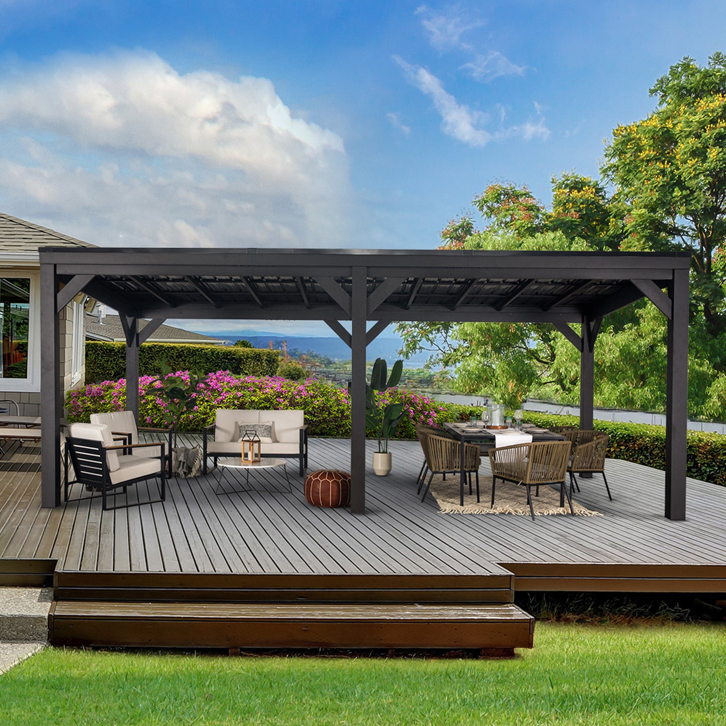 Wide front view of the Stonebridge gazebo covering outdoor lounge furniture