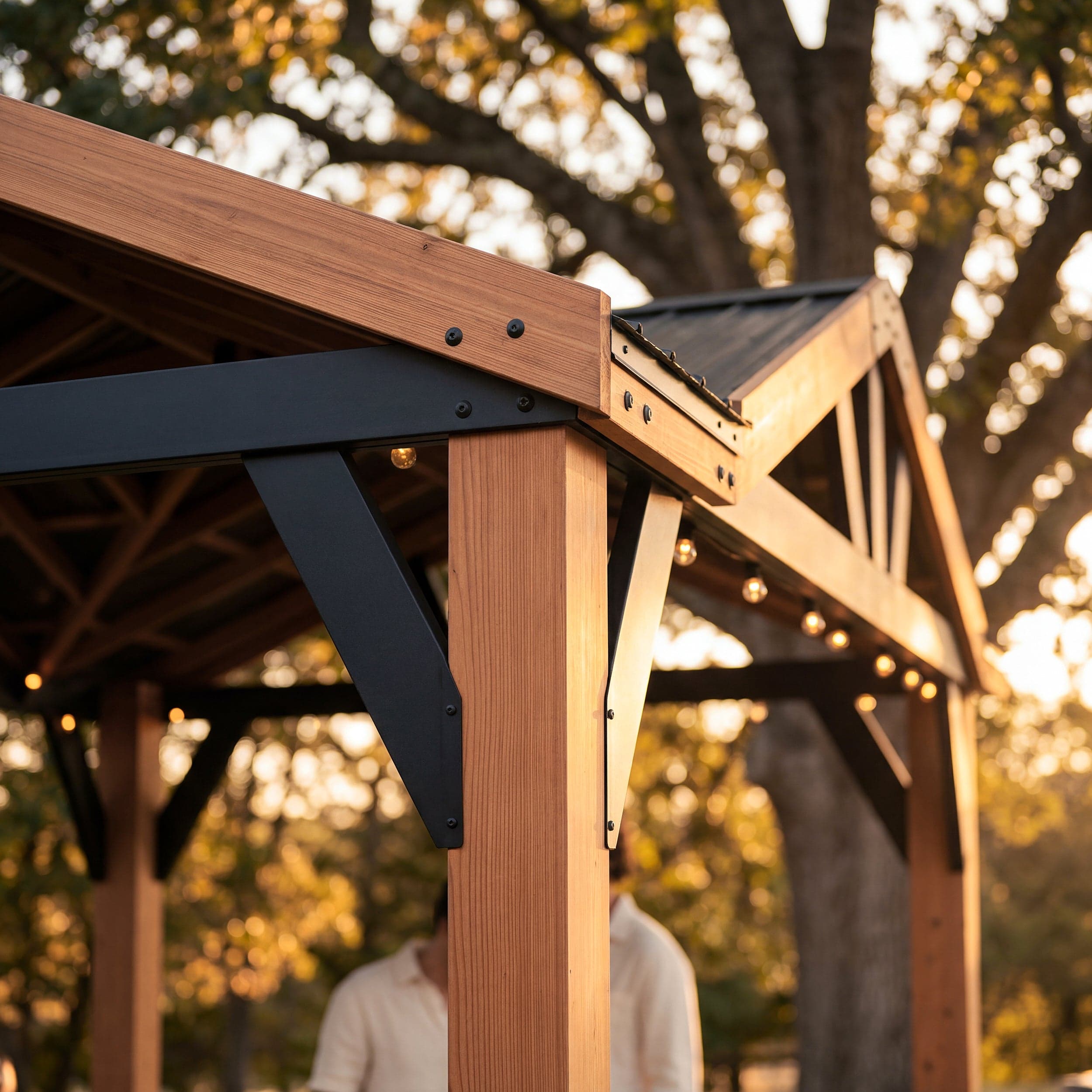 Opposite corner detail showing cedar support beams and steel brackets