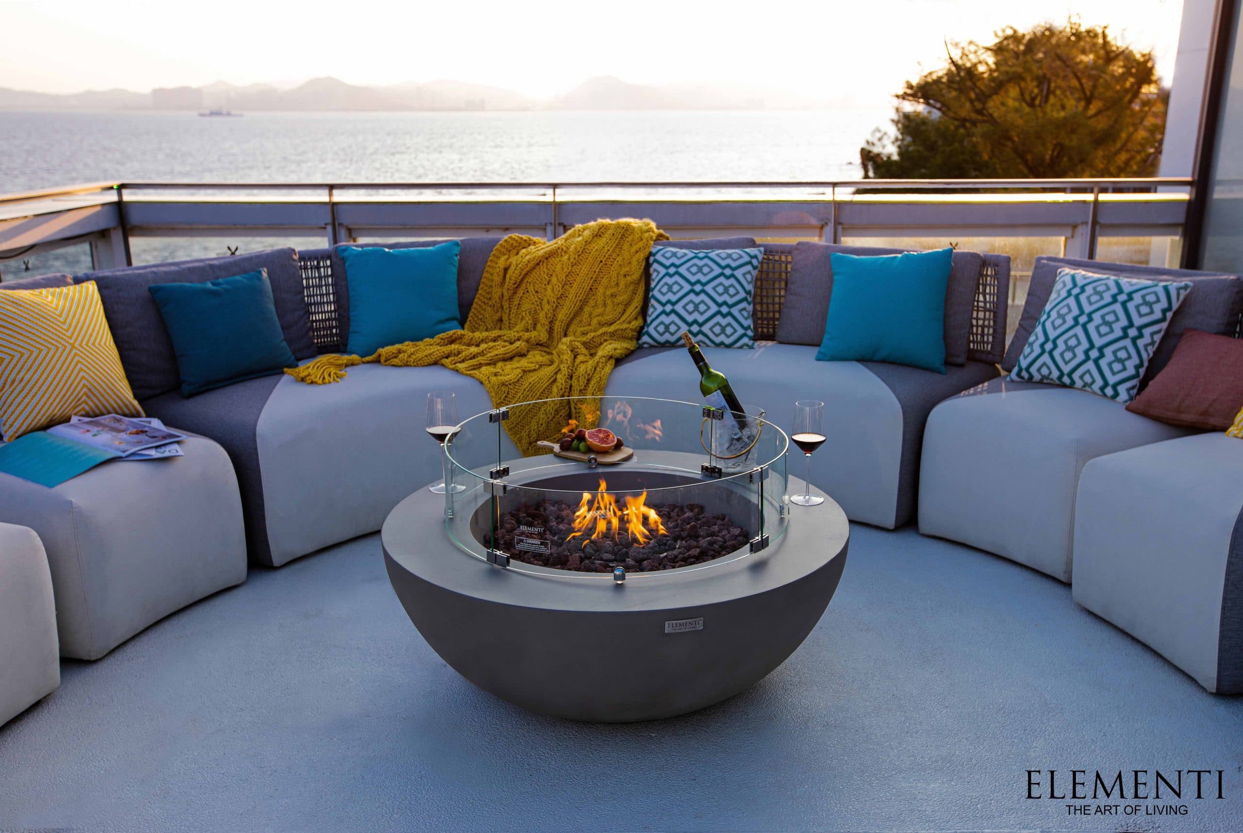 Lunar fire bowl on a seaside patio