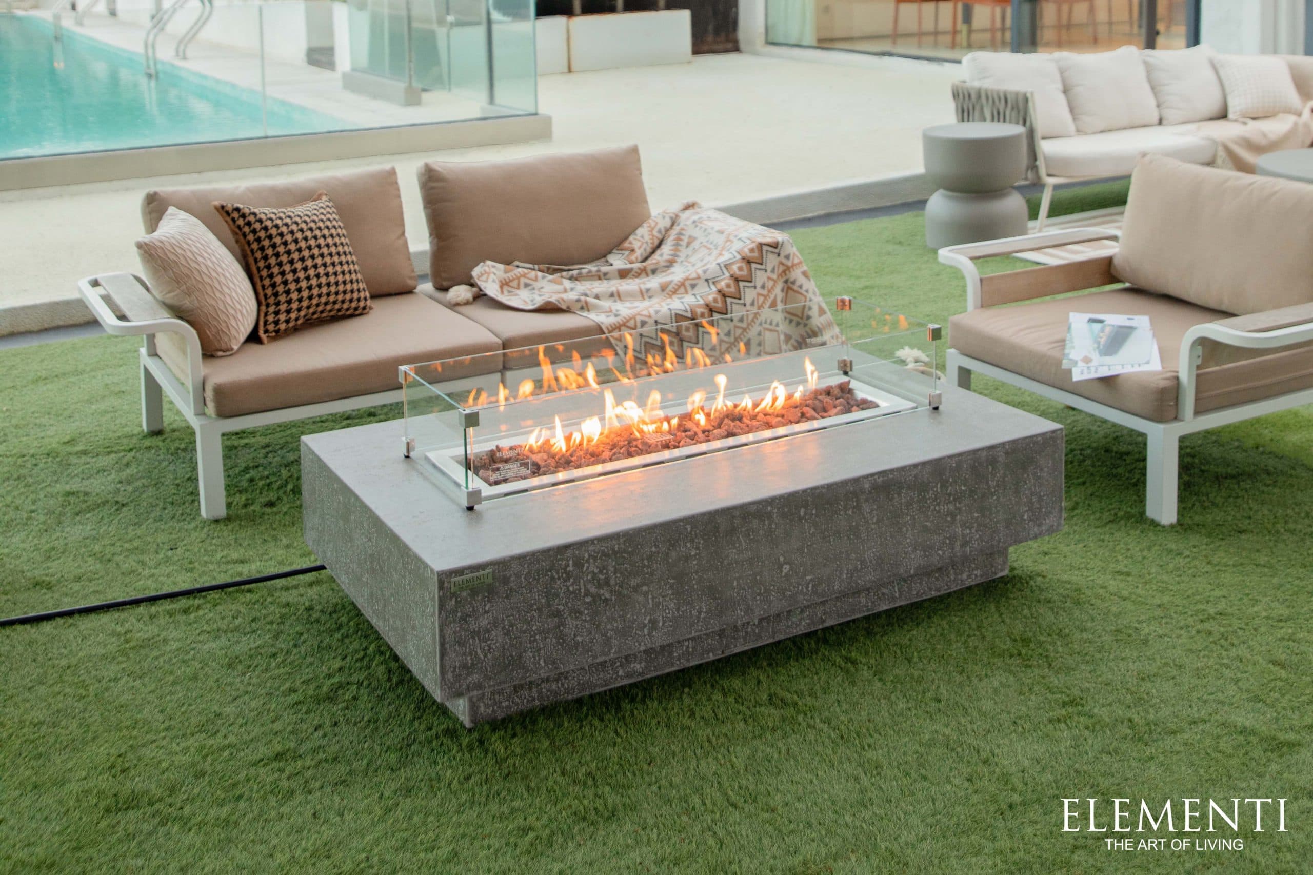 Oblique poolside view of the Hampton table
