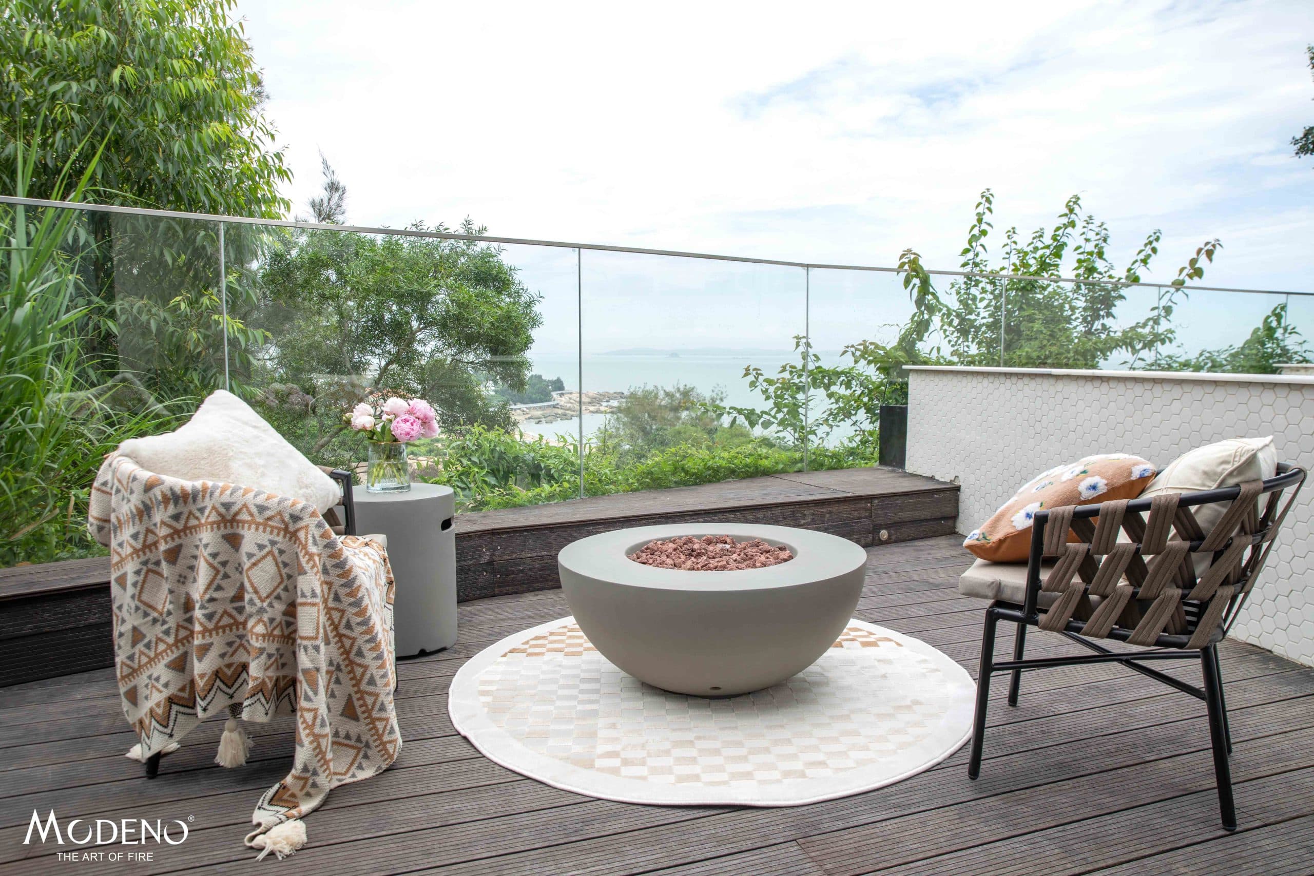 Roca fire bowl in a wide patio scene