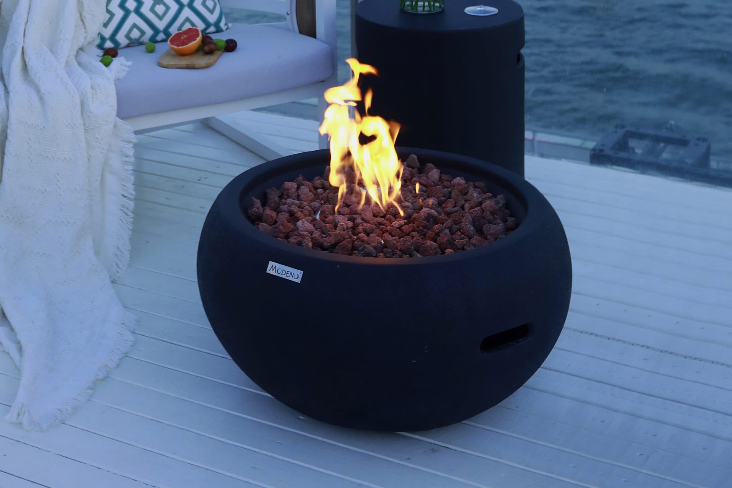 York fire bowl beside outdoor lounge chairs