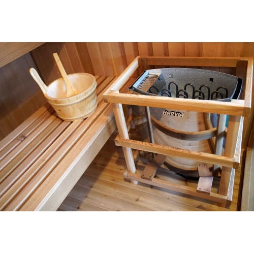 SunRay 4-Person Indoor Traditional Cedar Sauna with Double Bench and 6kW Harvia Heater — installed heater and bucket